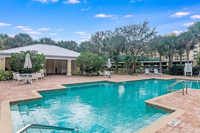 490 Sail Ln Unit 702, Merritt Island, FL 32953 - pool with fence and a patio