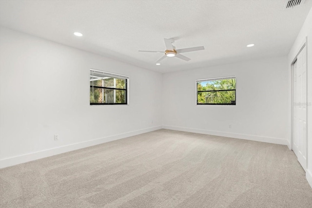 345 W Hornbeam Dr, Longwood, FL 32779 - unfurnished bedroom featuring recessed lighting, multiple windows, and light carpet