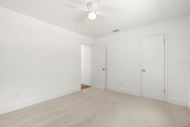 345 W Hornbeam Dr, Longwood, FL 32779 - unfurnished bedroom featuring carpet floors, baseboards, ceiling fan, and visible vents