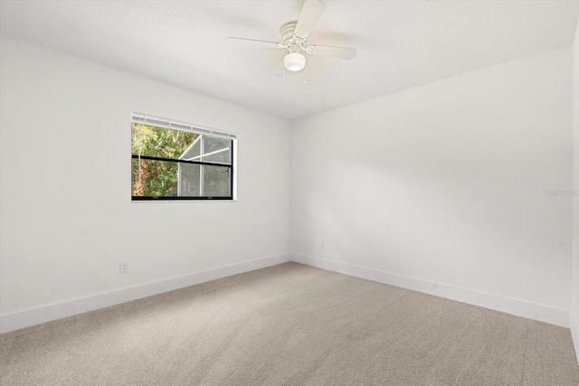 345 W Hornbeam Dr, Longwood, FL 32779 - unfurnished room with light colored carpet, a ceiling fan, and baseboards