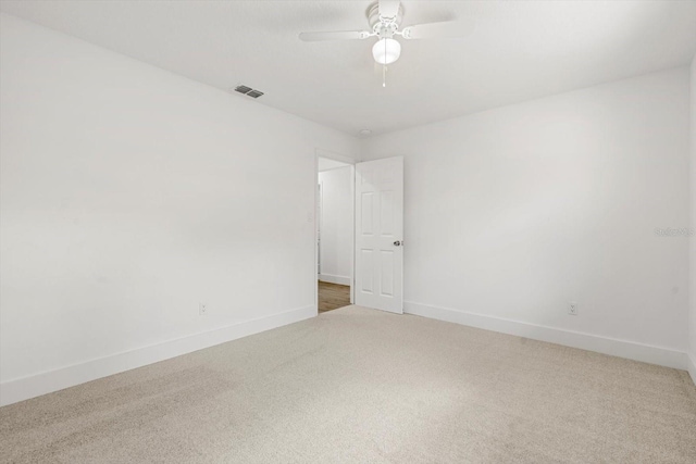 345 W Hornbeam Dr, Longwood, FL 32779 - spare room with carpet floors, baseboards, a ceiling fan, and visible vents