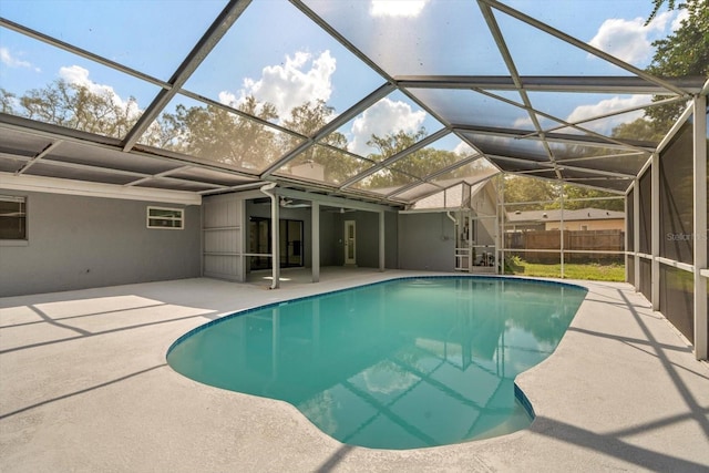 345 W Hornbeam Dr, Longwood, FL 32779 - view of pool with glass enclosure, a patio, a fenced in pool, and fence