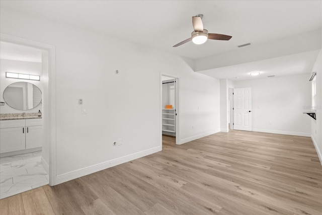 4246 Clarinda St, Orlando, FL 32811 - spare room with baseboards, light wood-style floors, and a ceiling fan