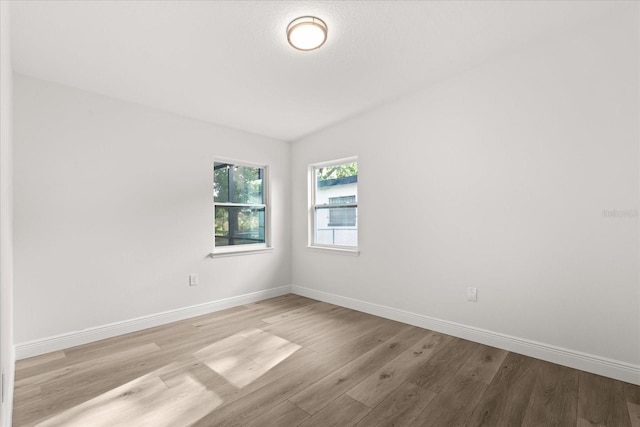 4246 Clarinda St, Orlando, FL 32811 - unfurnished room featuring baseboards and wood finished floors