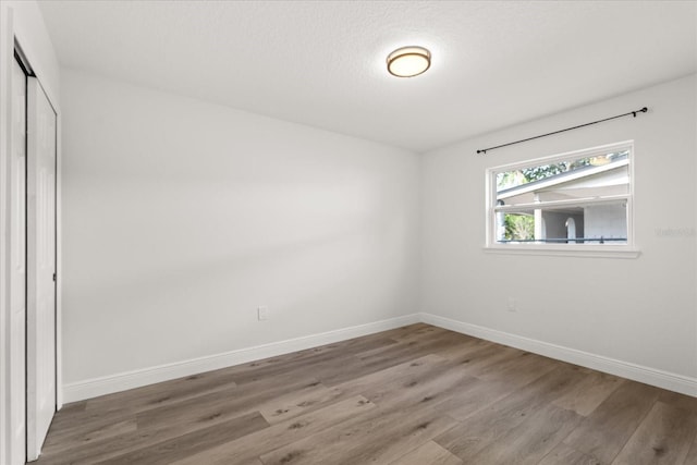 4246 Clarinda St, Orlando, FL 32811 - interior space featuring baseboards and wood finished floors