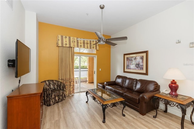 8100 Poinciana Blvd Unit 2109, Orlando, FL 32821 - living room featuring baseboards, light wood finished floors, and ceiling fan