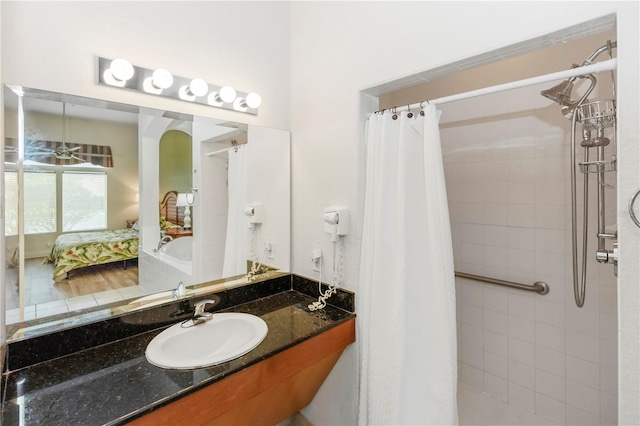 8100 Poinciana Blvd Unit 2109, Orlando, FL 32821 - ensuite bathroom featuring ensuite bath, a tile shower, and vanity