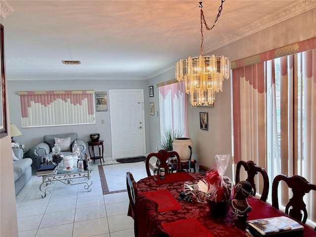 dining space with crown molding, light tile patterned flooring, baseboards, and a notable chandelier
