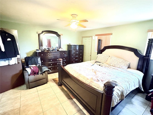 bedroom featuring ceiling fan and light tile patterned flooring