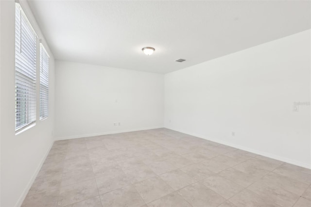 4705 Jasmine Cir, Leesburg, FL 34748 - empty room featuring baseboards