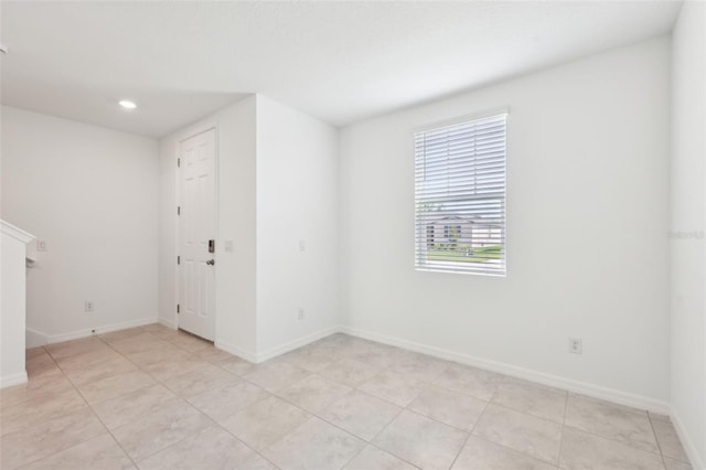 4705 Jasmine Cir, Leesburg, FL 34748 - spare room with baseboards, recessed lighting, and light tile patterned floors