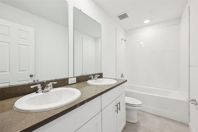 4705 Jasmine Cir, Leesburg, FL 34748 - full bathroom with toilet, shower / tub combination, double vanity, tile patterned floors, and recessed lighting