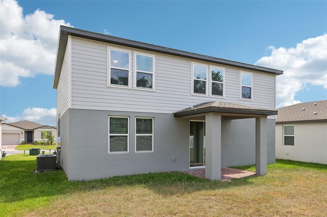 4705 Jasmine Cir, Leesburg, FL 34748 - rear view of property with central air condition unit, a lawn, stucco siding, and a patio area