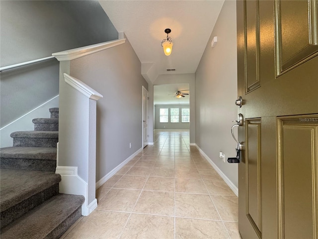 191 Chickasaw Berry Rd, Ocoee, FL 34761 - corridor with light tile patterned flooring, stairs, and baseboards
