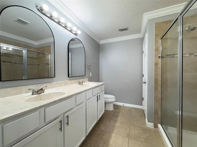 191 Chickasaw Berry Rd, Ocoee, FL 34761 - bathroom with double vanity, toilet, a stall shower, crown molding, and a textured ceiling