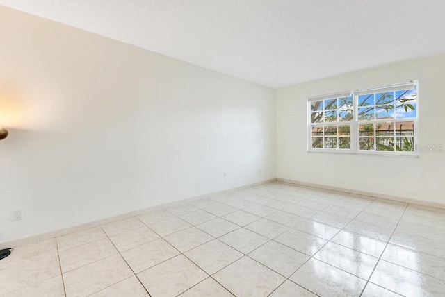 5763 Saint Christopher Dr Unit 55, Orlando, FL 32822 - unfurnished room featuring light tile patterned floors and baseboards