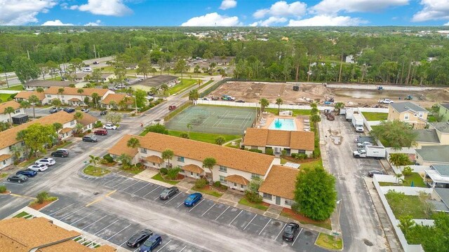 5763 Saint Christopher Dr Unit 55, Orlando, FL 32822 - birds eye view of property featuring a view of trees and a residential view