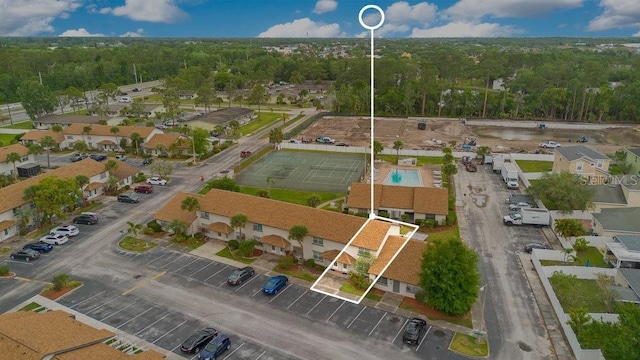 5763 Saint Christopher Dr Unit 55, Orlando, FL 32822 - birds eye view of property with a wooded view and a residential view