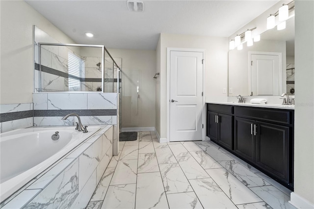 full bath featuring marble look tiles, a garden tub, a stall shower, baseboards, and vanity