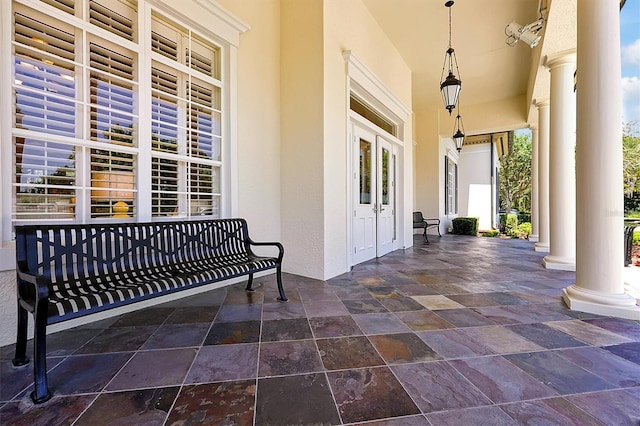 view of patio featuring a porch