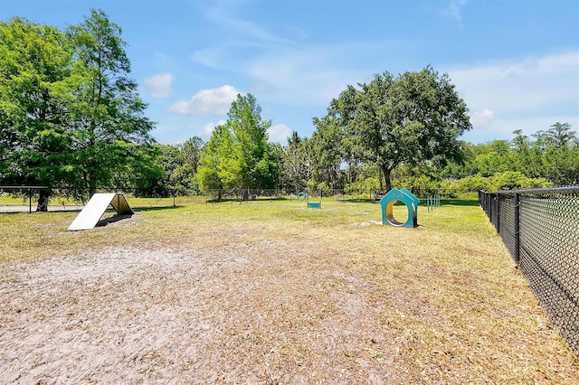surrounding community featuring fence