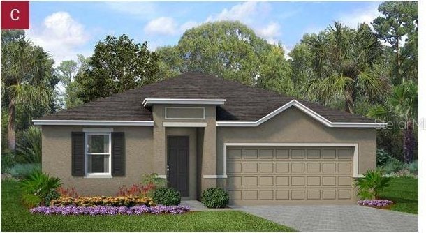 527 Silver Palm Dr, Haines City, FL 33844 - view of front of property with stucco siding, an attached garage, driveway, and roof with shingles
