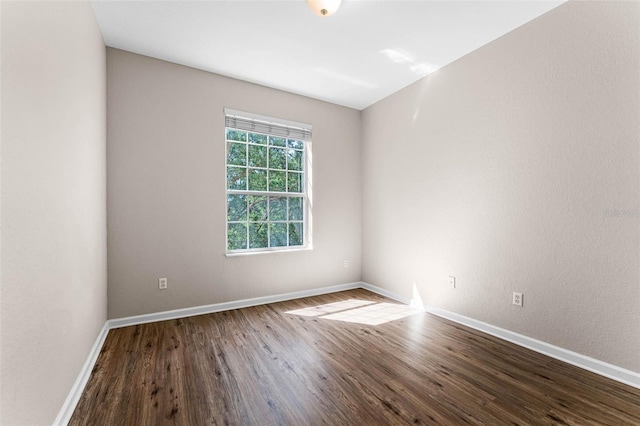 3314 Robert Trent Jones Dr Unit 308, Orlando, FL 32835 - empty room featuring baseboards and wood finished floors