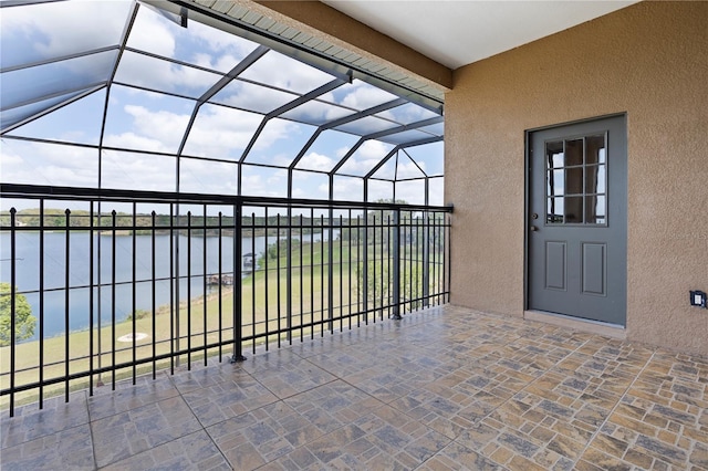 view of patio featuring a water view
