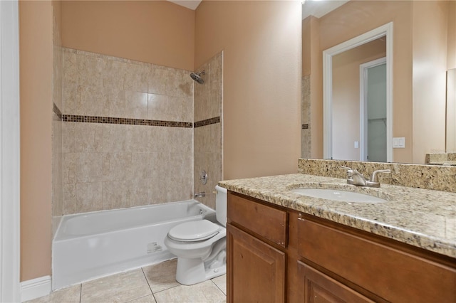 bathroom with tile patterned floors, vanity, toilet, and shower / tub combination
