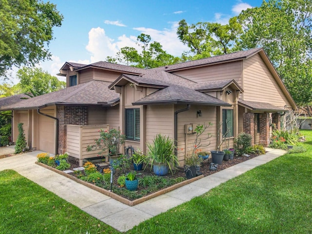 419 Newton Pl, Longwood, FL 32779 - view of front of home with driveway, a shingled roof, a garage, and a front yard