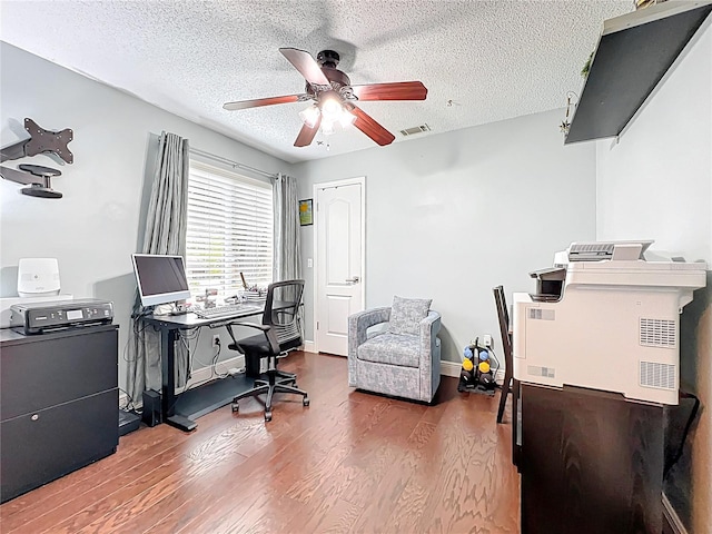 419 Newton Pl, Longwood, FL 32779 - office with a ceiling fan, wood finished floors, a textured ceiling, baseboards, and visible vents