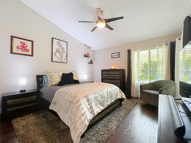 419 Newton Pl, Longwood, FL 32779 - bedroom with ceiling fan, a textured ceiling, vaulted ceiling, and wood finished floors