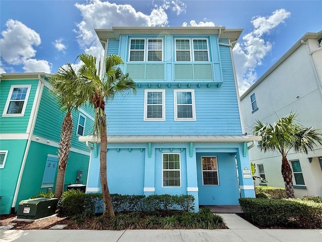 7968 Shaker St, Kissimmee, FL 34747 - view of front of house with a standing seam roof and metal roof