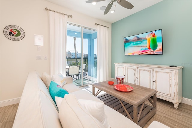 7968 Shaker St, Kissimmee, FL 34747 - living room featuring recessed lighting, light wood-style flooring, baseboards, and a ceiling fan
