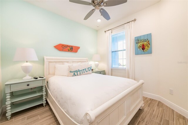 7968 Shaker St, Kissimmee, FL 34747 - bedroom featuring baseboards, a ceiling fan, and wood finish floors