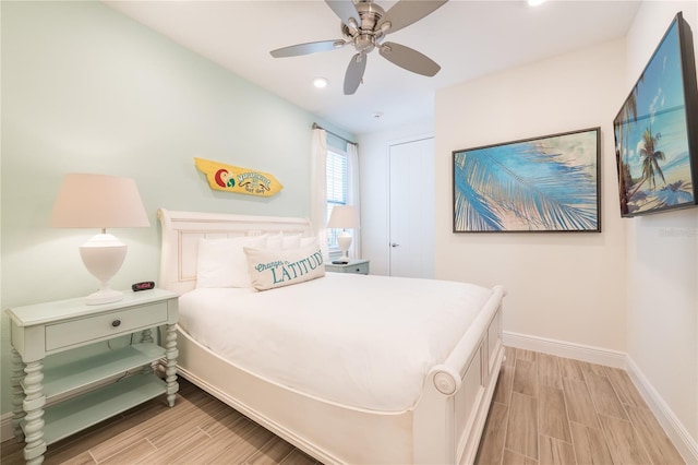 7968 Shaker St, Kissimmee, FL 34747 - bedroom featuring ceiling fan, baseboards, wood finish floors, and recessed lighting