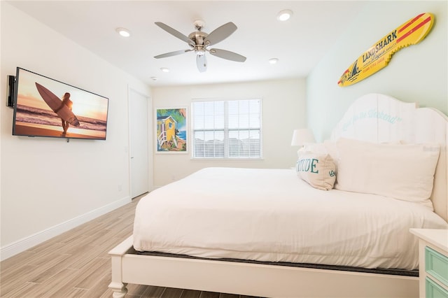 7968 Shaker St, Kissimmee, FL 34747 - bedroom with light wood-style floors, ceiling fan, baseboards, and recessed lighting