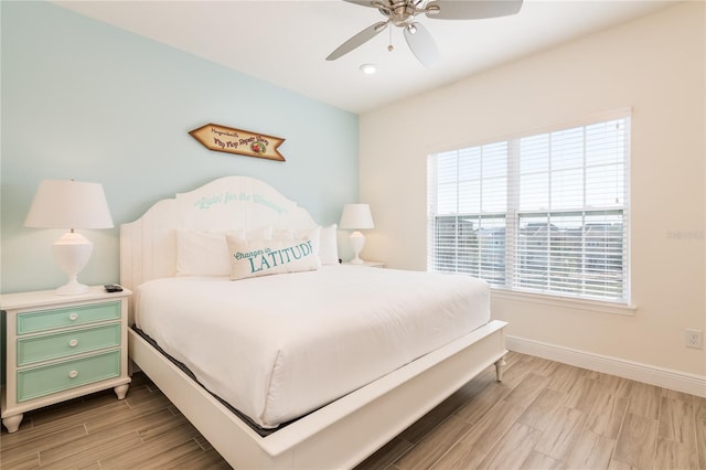 7968 Shaker St, Kissimmee, FL 34747 - bedroom with baseboards, ceiling fan, and wood finished floors