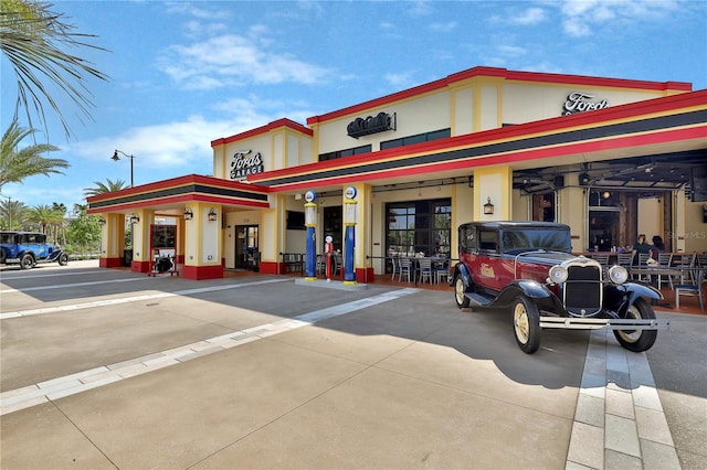 7968 Shaker St, Kissimmee, FL 34747 - view of building exterior featuring uncovered parking