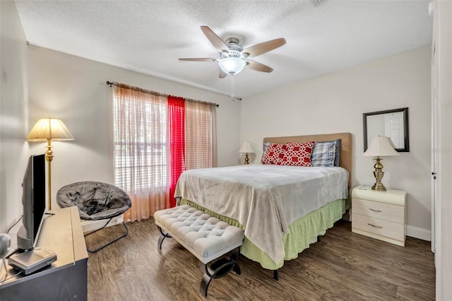 280 Bay St, Apopka, FL 32712 - bedroom featuring baseboards, a textured ceiling, wood finished floors, and ceiling fan