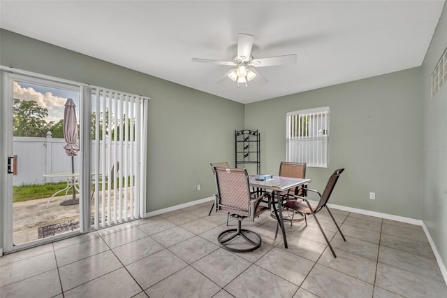 280 Bay St, Apopka, FL 32712 - dining room with baseboards, ceiling fan, and light tile patterned floors