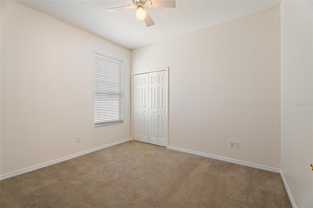 9723 Pecky Cypress Way, Orlando, FL 32836 - empty room with a ceiling fan and light colored carpet