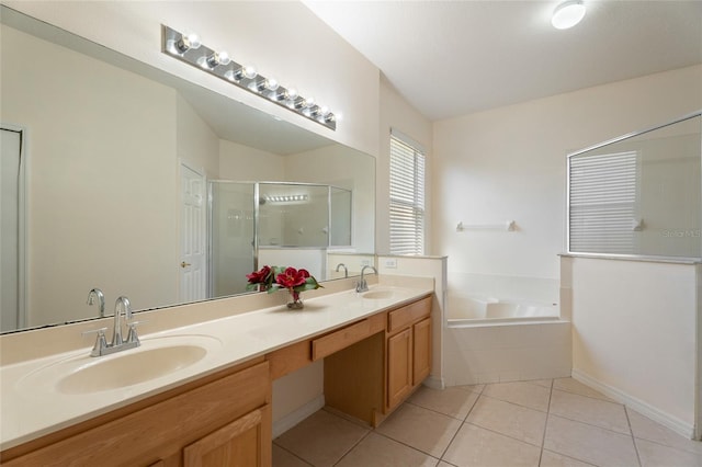 9723 Pecky Cypress Way, Orlando, FL 32836 - full bathroom featuring tile patterned flooring, a stall shower, a garden tub, and double vanity