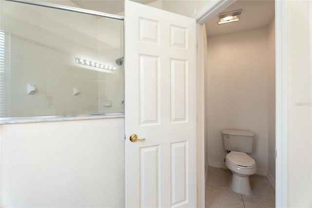 9723 Pecky Cypress Way, Orlando, FL 32836 - bathroom with a tile shower and tile patterned flooring