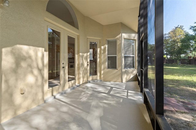 9723 Pecky Cypress Way, Orlando, FL 32836 - unfurnished sunroom with french doors and vaulted ceiling