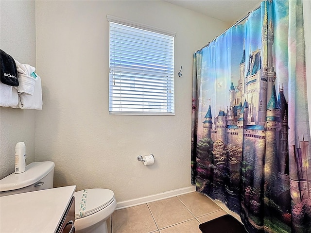 bathroom featuring vanity, baseboards, tile patterned floors, a shower with curtain, and toilet