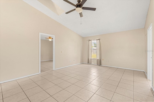 empty room featuring high vaulted ceiling, baseboards, a ceiling fan, and light tile patterned flooring