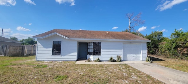single story home with fence, concrete driveway, and a front lawn