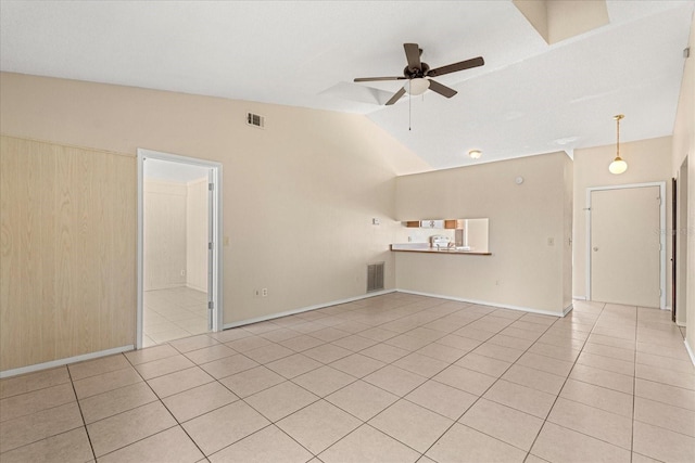 unfurnished living room featuring light tile patterned flooring, ceiling fan, lofted ceiling, and visible vents