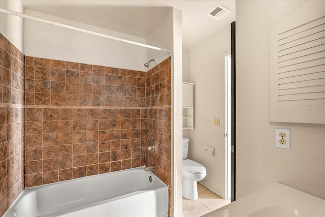 bathroom with shower / bathing tub combination, visible vents, tile patterned flooring, and toilet